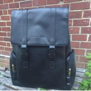 Elegant Black Leather Backpack by [Brand]